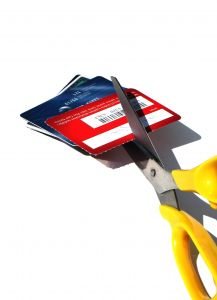 scissors cutting credit cards