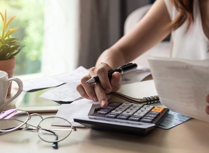 person using a calculator