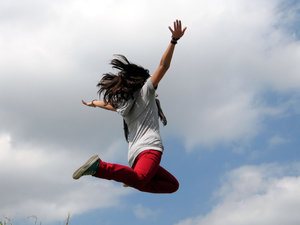 Girl jumping in the air